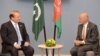 Pakistani Prime Minister Nawaz Sharif (L) speaks with Afghan President Ashraf Ghani during the BRICS/SOC emerging economies summit in the Russian city of Ufa in July 10.