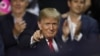 US -- TAMPA, FL - JULY 31: President Donald Trump gestures during his Make America Great Again Rally at the Florida State Fair Grounds Expo Hall on July 31, 2018 in Tampa, Florida. Before the rally, President Trump visited the Tampa Bay Technical High Sch