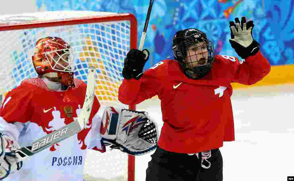 Phoebe Stanz of Switzerland celebrates after scoring against Russia during the women&#39;s quarterfinal match. (EPA/Srdjan Suki)