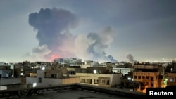 Smoke rises following an explosion in Tehran on March 7. 