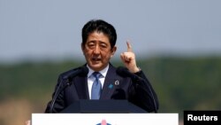 "Cilj posete je znak sećanja na žrtve rata a ne upućivanje izvinjenja", izjavio je portparol japanske vlade