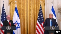 Israeli Prime Minister Benjamin Netanyahu (L) is pictured at joint news conference with U.S. President Donald Trump.