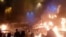 Protesters gather as vehicles burn in Tehran in a screen grab obtained from a social media video released on January 9.