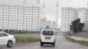 Turkmenistan. Mosque at Mir 7 micro district in Ashgabat. Road. Car. Building. April 2019