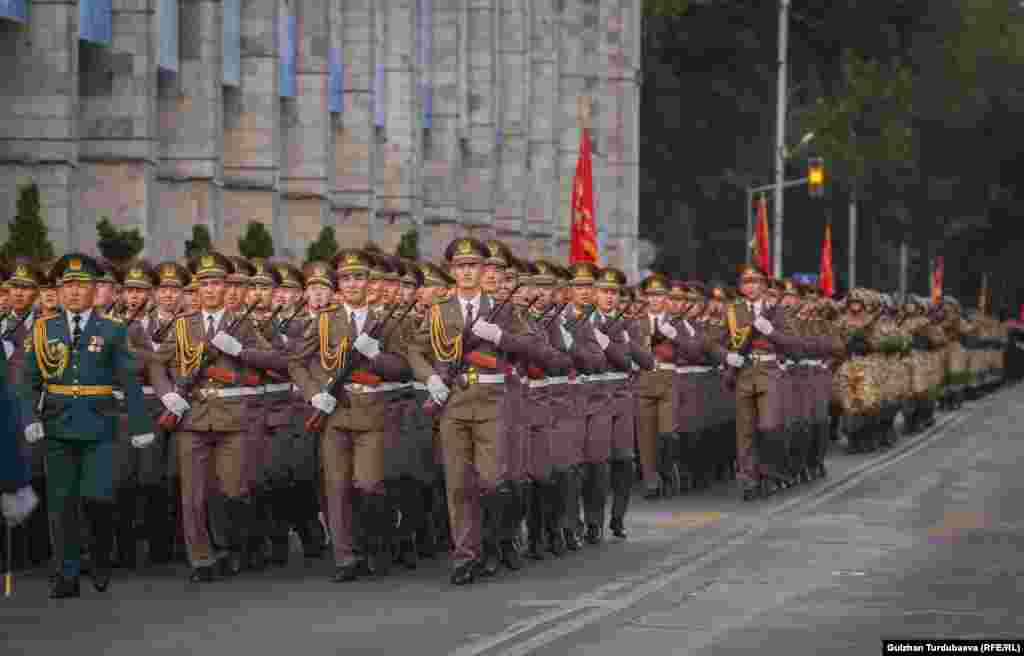 Soldiers march during the parade. Kyrgyzstan&#39;s independence era has been marked by successes in some areas, such as a relatively free press, but the country&#39;s economy lags far behind other former Soviet republics.&nbsp;