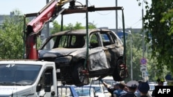 Эвакуация взорванного автомобиля, подмосковная Балашиха, Россия, 9 июня 2026 года