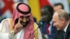 Наследный принц Саудовской Аравии Мохаммед бен Салман и президент России Владимир Путин на открытии саммита лидеров G20 в Буэнос-Айресе, 30 ноября 2018 года