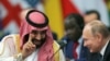 ARGENTINA -- Saudi Arabian Crown Prince Mohammed bin Salman speaks with Russia's President Vladimir Putin during the opening of the G20 leaders summit in Buenos Aires, November 30, 2018