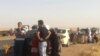 Iraqi Families Flee Mosul Fighting