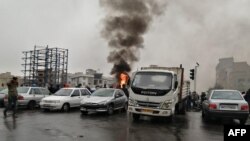 Ирандагы нааразылык учурунда тартылган сүрөт. 