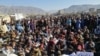 A protest for Internet services makes its way through the main bazaar in Wana, South Waziristan, on February 11. 