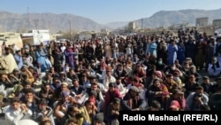 A protest for Internet services makes its way through the main bazaar in Wana, South Waziristan, on February 11. 