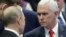 Russian President Vladimir Putin (left) and U.S. Vice President Mike Pence attend the 13th East Asia summit plenary session on the sidelines of the 33rd Association of Southeast Asian Nations (ASEAN) summit in Singapore, November 15, 2018.