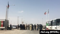 FILE: A prisoner exchange along the border between Iran and Afghanistan.