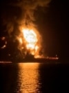 Oil Tankers Ablaze In Gulf After Iranian Drone Boat Attack