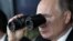 Russian President Vladimir Putin watches a military exercise in 2019.