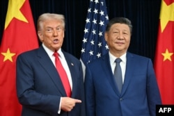 Дональд Трамп и КНР Си Цзиньпин на переговорах на авиабазе Кимхэ в южнокорейском городе Пусан. 30 октября 2025 года