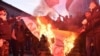 Члены ультрарадикального движения «Грузинский марш» сжигают радужный флаг (ЛГБТ). Тбилиси, 08.11.2019