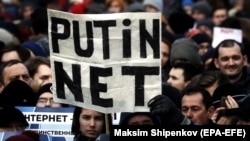 People at an opposition rally in Moscow in March 2019 rally against the bill about the sovereign RuNet and censorship on the Internet. 