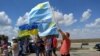 Байкери привезли на адмінкордон Криму український і кримськотатарський прапори