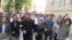 Some 100 opposition activists turned out for the unauthorized demonstration in Baku. 