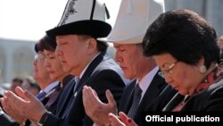 Roza Otunbaeva (right), a former Kyrgyz president, at a memorial service in Bishkek in April 2012.