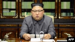 North Korean leader Kim Jong Un delivers a statement in Pyongyang in a picture taken on September 21 and released by North Korea's official Korean Central News Agency (KCNA) on September 22.