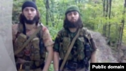 A screen grab of purported rebels "Saydi" and "Iskhak" as shown in a video posted on the Kavkazcenter website.