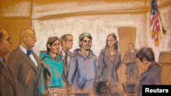 A court sketch of the men accused of aiding Islamic State: Akhror Saidakhmetov (third left), Abdurasul Juraboev (fourth right), and Akhror Saidakmetov (center).