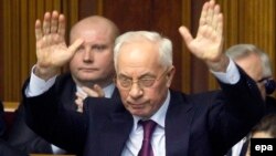 Ukraine -- Prime Minister Mykola Azarov gestures during the parliamentary session in Kyiv, December 3, 2013 