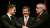 Turkish Foreign Minister Ahmet Davutoglu (center) brought together his Serbian and Bosnian counterparts, Vuk Jeremic (left) and Sven Alkalaj at a meeting in Ankara in February. 