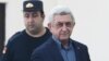 Armenia -- Former President Serzh Sarkisian arrives at a courtroom in Yerevan, February 25, 2020.