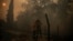 Firefighters spray water on a burning residential area during a wildfire near Lege Cap Ferret, southwestern France on July 23, 2026.
