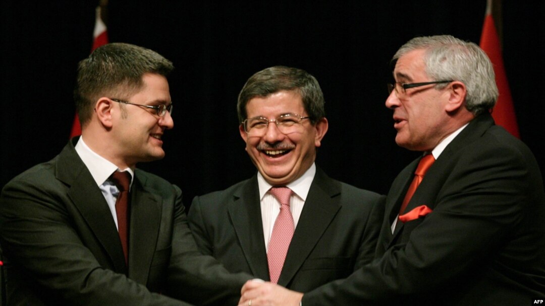 Turkish Foreign Minister Ahmet Davutoglu (center) brought together his Serbian and Bosnian counterparts, Vuk Jeremic (left) and Sven Alkalaj at a meeting in Ankara in February. 