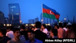 Azerbaijan fans celebrate in Baku during the final of the Eurovision Song Contest in May 2012.