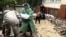 Personnel from the Crimean main directorate of the Russian Emergencies Ministry are at work in Koreiz during a flood caused by a storm in October 2026.