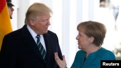 Donald Trump și Angela Merkel la Washington