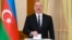 Azerbaijani leader Ilham Aliyev casts his vote in Nagorno-Karabakh in a snap presidential election on February 7. 