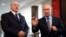 Russian President Vladimir Putin (right) speaks next to Belarusian President Alyaksandr Lukashenka during their meeting in the Black sea resort of Sochi on February 15.