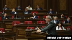 Armenian caretaker Prime Minister Nikol Pashinian speaks in parliament on May 10.