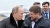 Russia -- Russia's Prime Minister Vladimir Putin (L) speaks with Chechnya's leader Ramzan Kadyrov (R) 