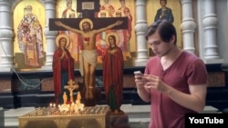 In a case that has drawn fire from international rights watchdogs, Ruslan Sokolovsky faces up to five years in prison for videos he posted on YouTube, including one of him playing Pokemon Go in a Yekaterinberg cathedral. (file photo)