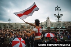 The protest on August 26 moments before riot police arrived and began to detain people.