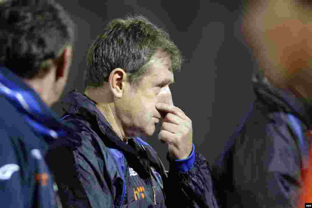 Bosnia's head coach Safet Susic looks on anxiously during a tight game.