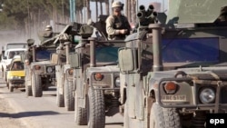 U.S. military vehicles on the streets of western Afghanistan