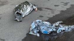 Son Discovers Moment Of Father's Death In Video Of Kyiv Mass Shooting
