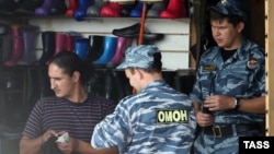 A police raid on Moscow's Sadovod market on August 7