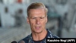 دریابان جوزف آکوین فرمانده ناوگان هفتم «به خاطر از دست دادن اعتماد به قابلیت فرماندهی او» از مقامش برکنار شده است.