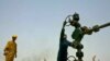 Workers carry out checks at the Kirkuk oil field.