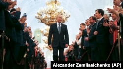 Vladimir Putin enters to take the oath of office during his inauguration ceremony in Moscow on May 7.